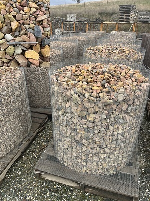 Photo of CANDY ROCK Crushed gravel. Decretive natural stone gravel sold by Rolleri Landscape Products.