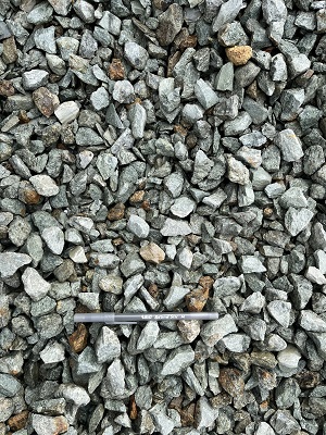 Photo of JR Crushed gravel. Decretive natural stone gravel sold by Rolleri Landscape Products.