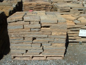 Photo of Old English Pavers natural limestone snaped stone paver. Natural stone sold by Rolleri Landscape Products.