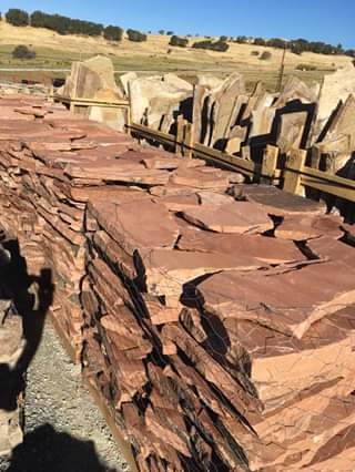 Photo of Strawberry 1 inch Patio random shaped limestone. Natural Stone sold by Rolleri Lanscape Products.