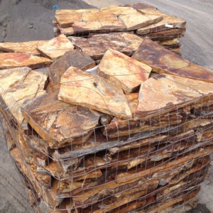 Photo of Canadian Chocolate Patio. Use for landscape patios, walkway, stepping stones. Natural stone sold by Rolleri Landscape Products.