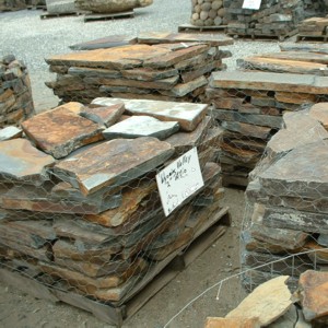Photo of Wyoming Valley Slate 1 1/2 in. Patio flagesone slate. Used for dry laid random shaped natural stone patios, walk ways, graden paths, or natural stone pavers. Natural stone sold by Rolleri Landscape Products.